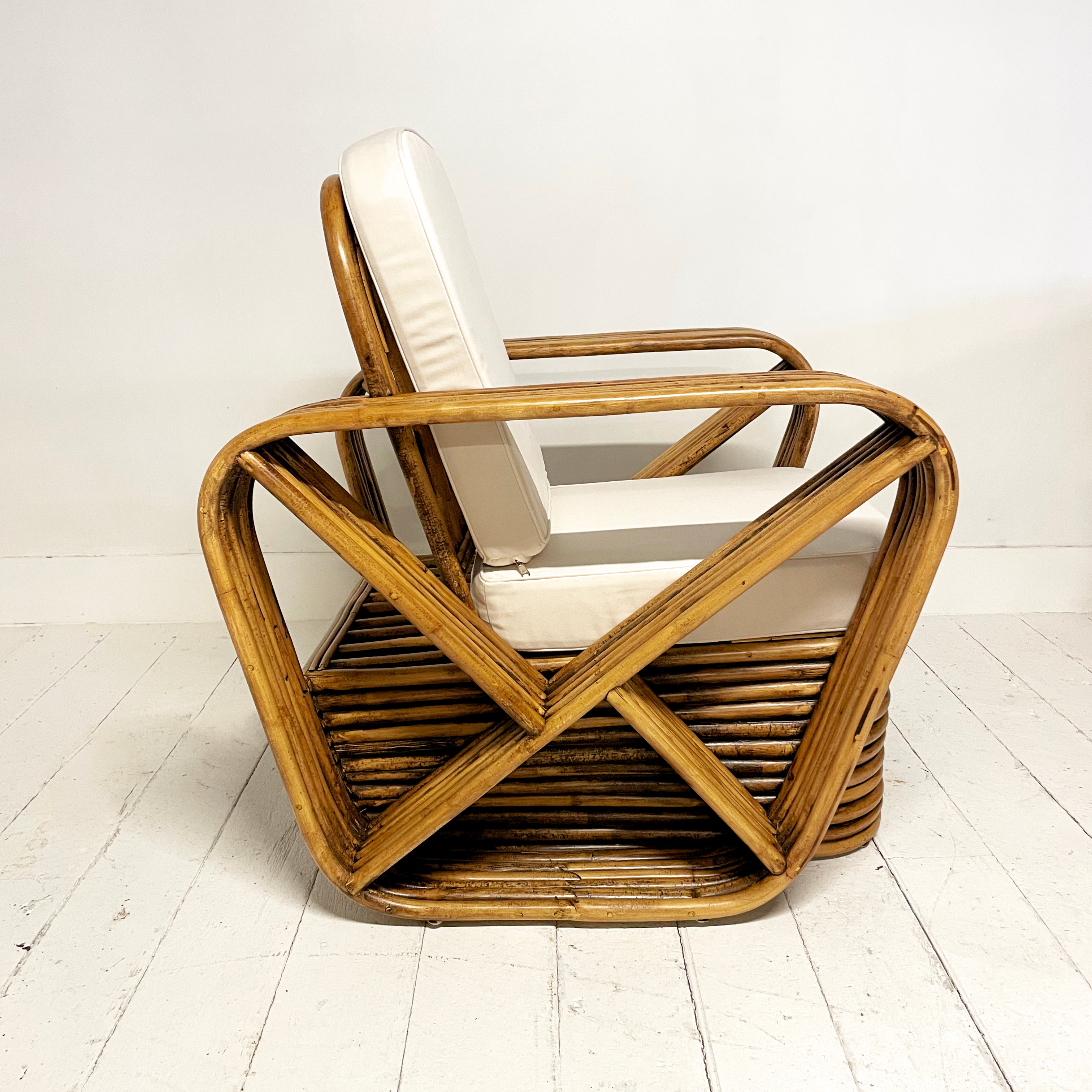 Caramel Midcentury Six Strand Rattan Arm Chair
