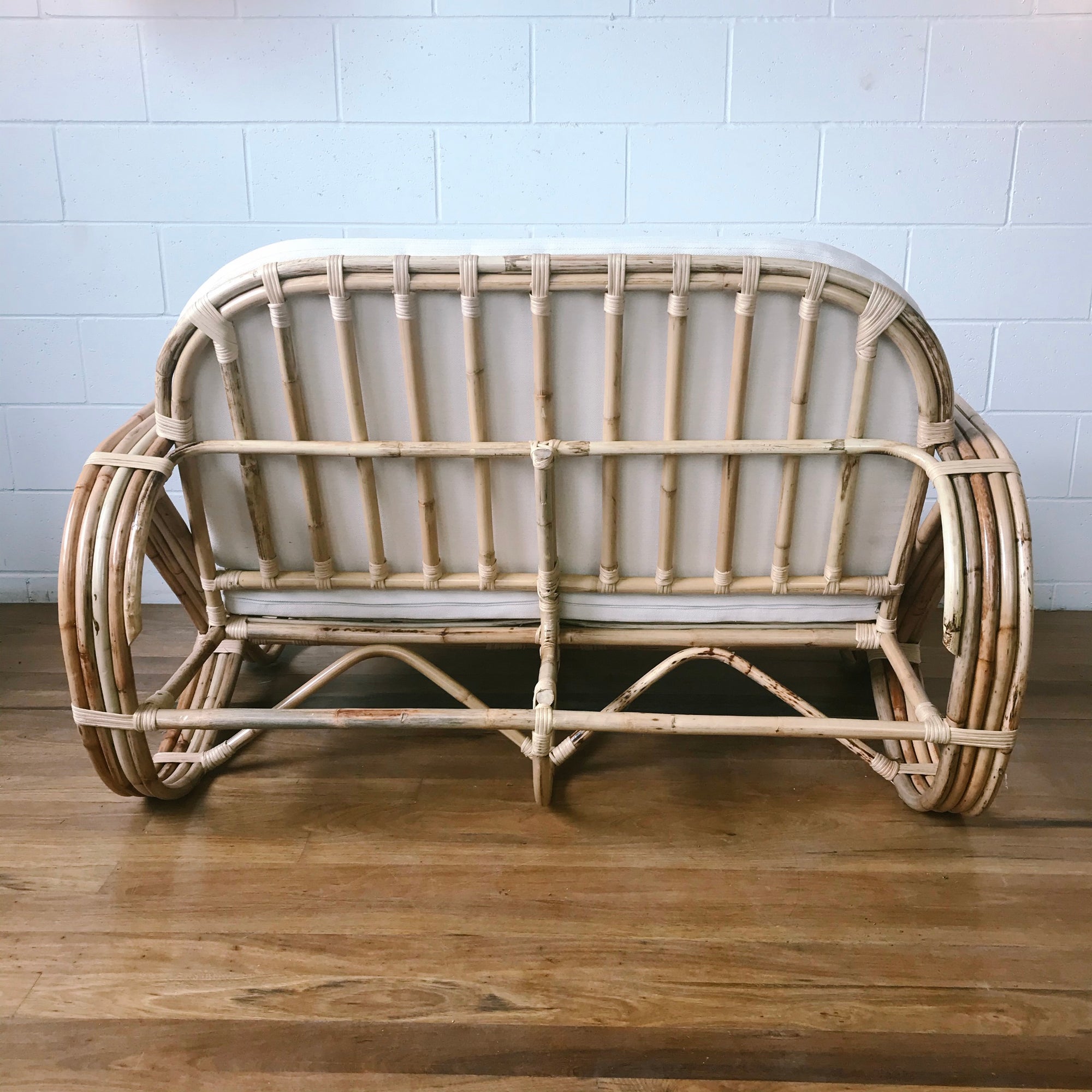 Natural Pretzel Rattan 2 Seater Lounge - Cream Cushion