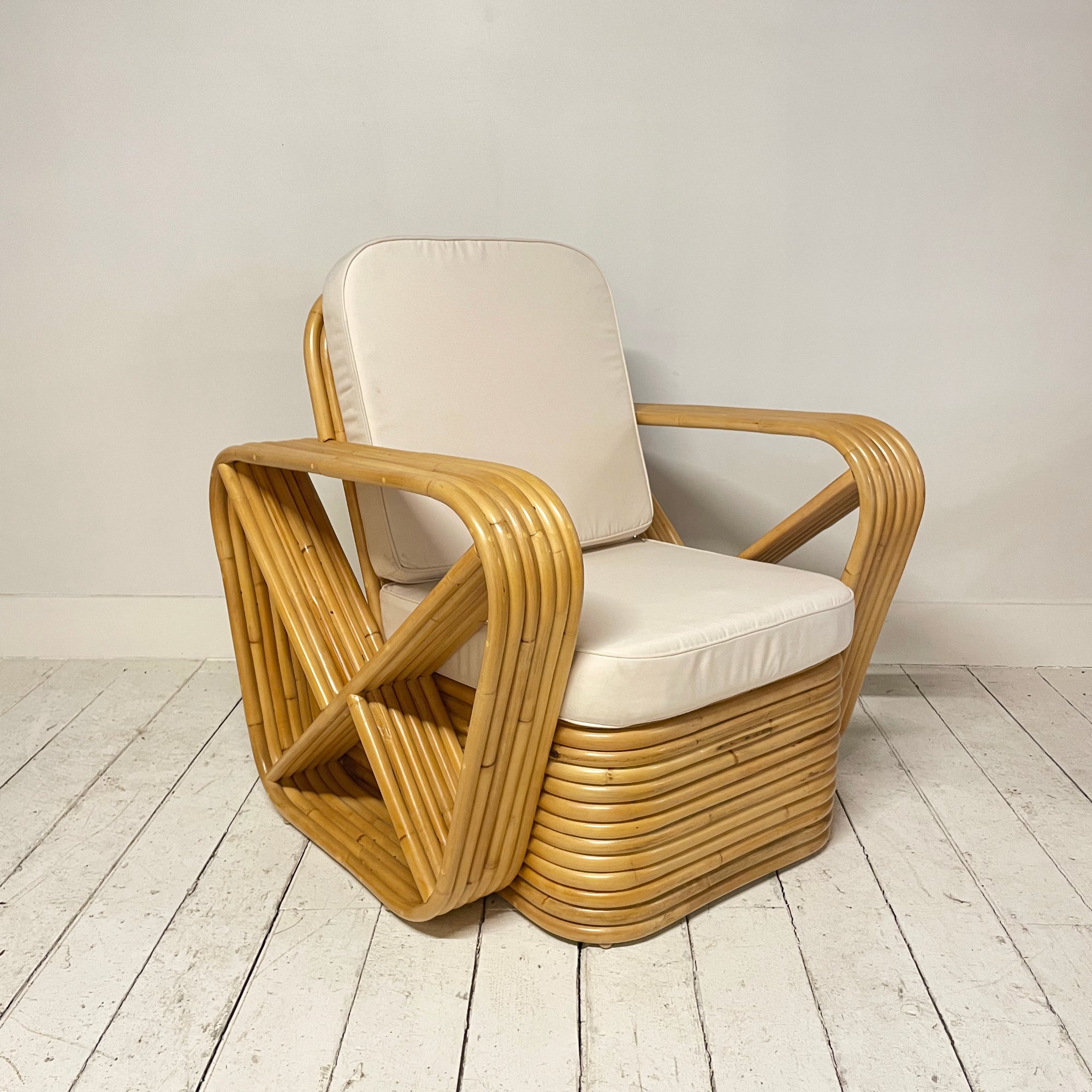 Honey Midcentury Six Strand Rattan Arm Chair
