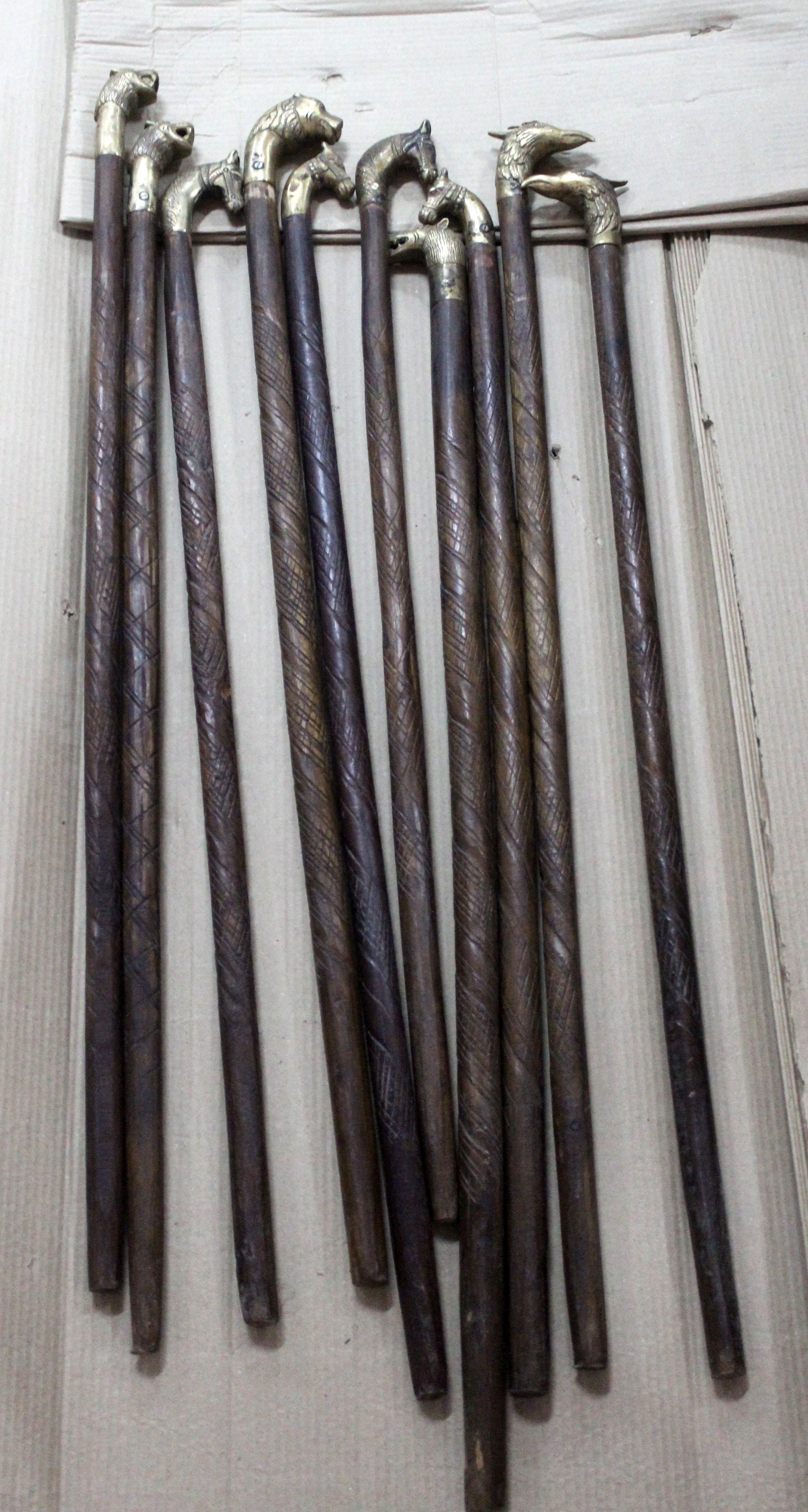 Brass and Carved Timber Walking Sticks