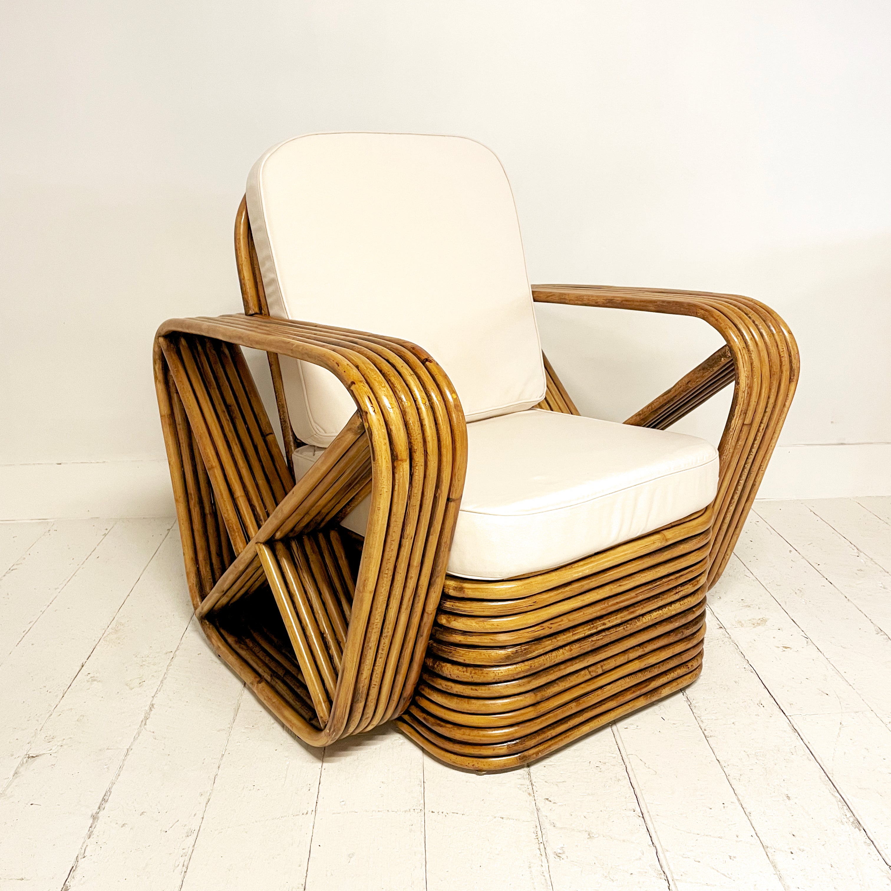Caramel Midcentury Six Strand Rattan Arm Chair